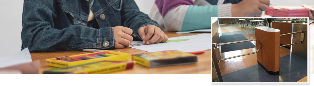 Children drawing and studying in classroom